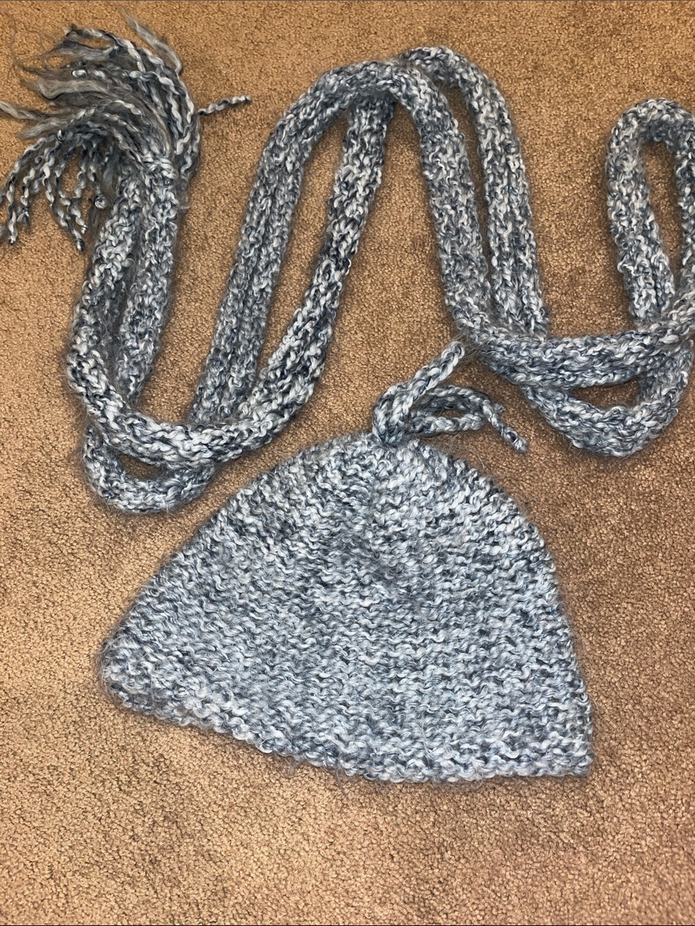 Soft super long crochet knit scarf with matching knit hat. Multiple blue shades.
